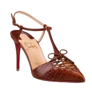 Christian Louboutin Croc embossed heels
Retail 995